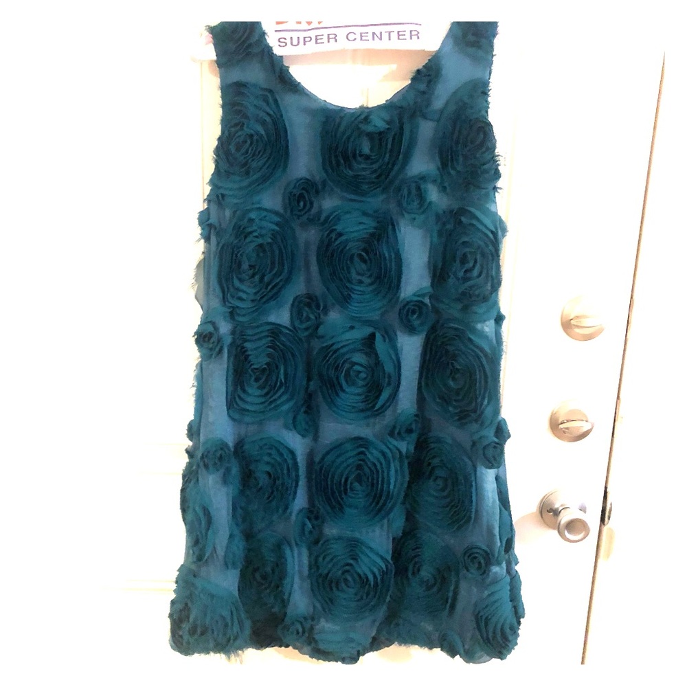 Turquoise dress with floral pattern
